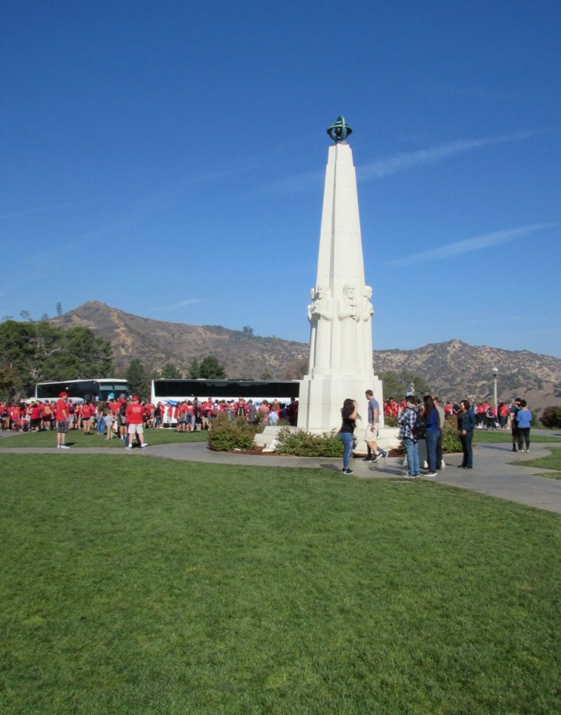 Astronomer's Monument with buses of students.