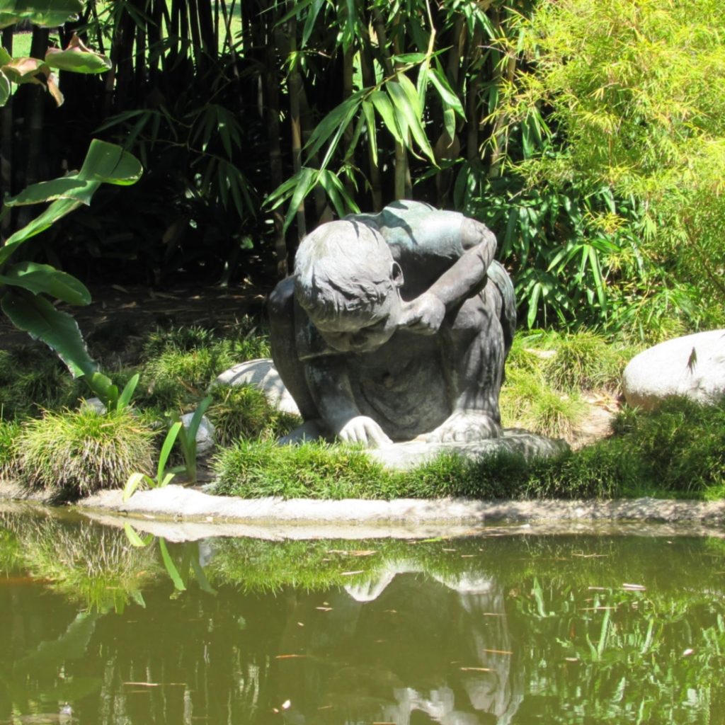 Boy at the pond sculpture