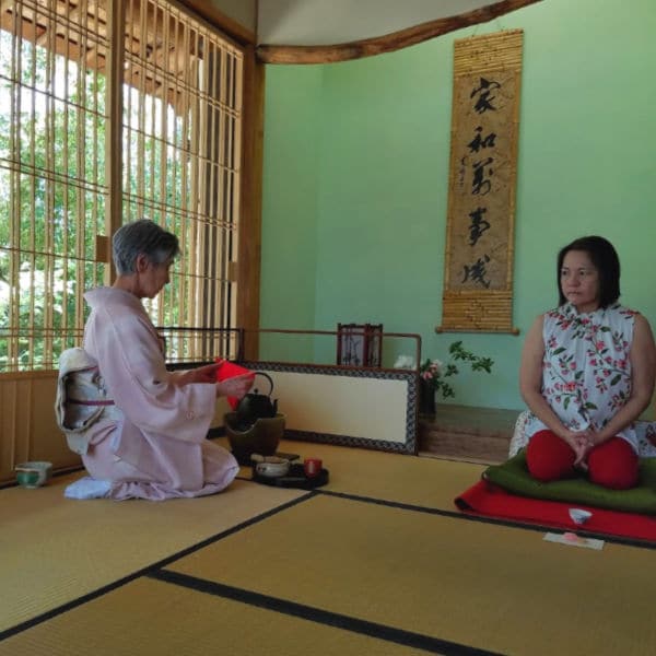 Geisha preparing tea service