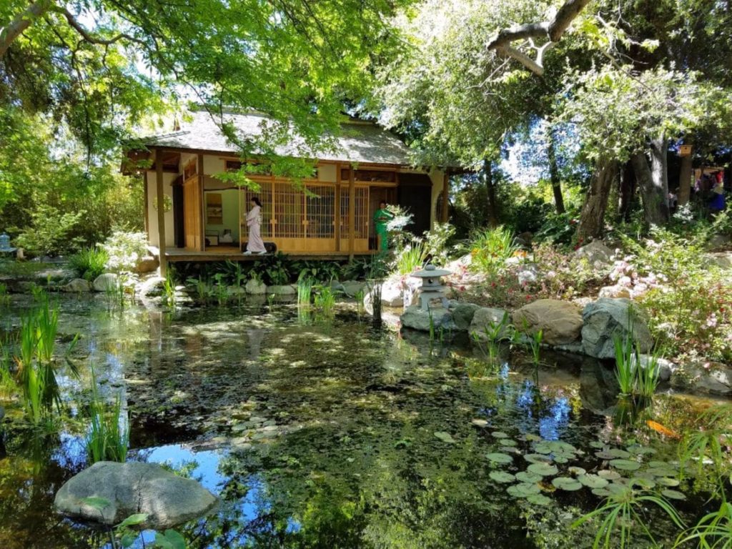 Tea house, koi pond and geisha at Storrier Sterns Japanese Garden in Pasadena