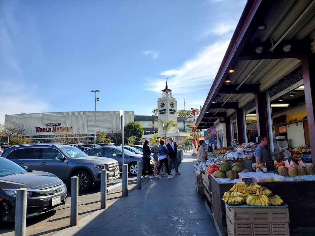 The Original Farmer's Market clock tower and produce stands.