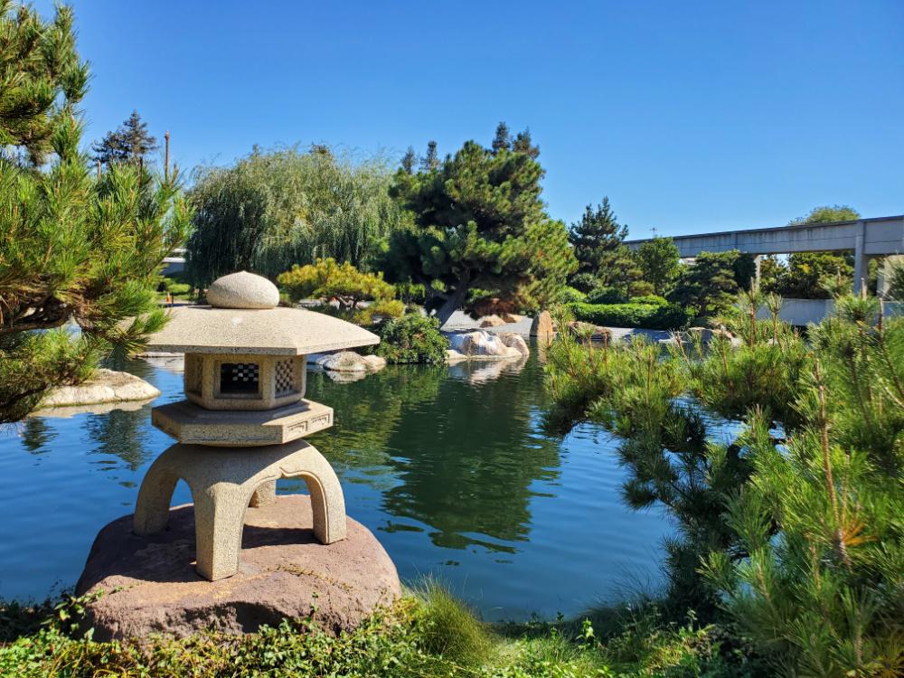Pond a carved stone at the Japanese Garden Van Nuys