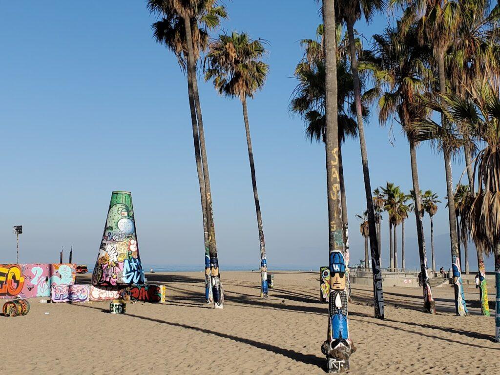 Painted palm trees and cones on Venice Beach