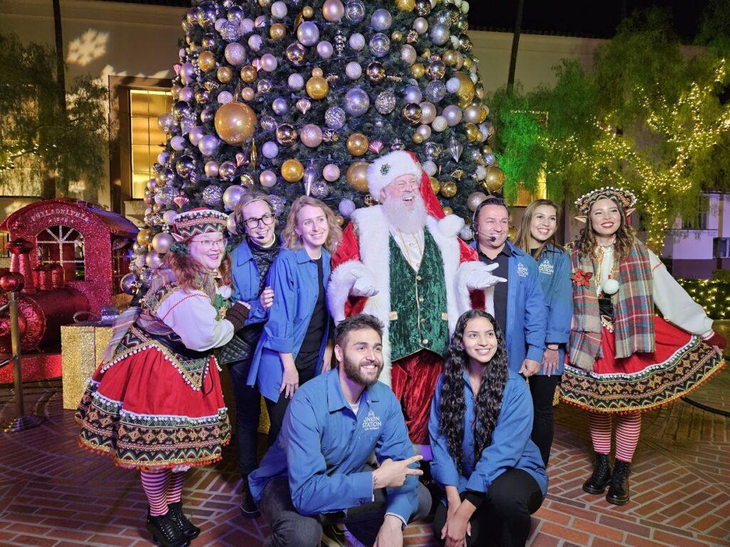 Santa, his elves and the Metro L.A. staff next to the Christmas Tree