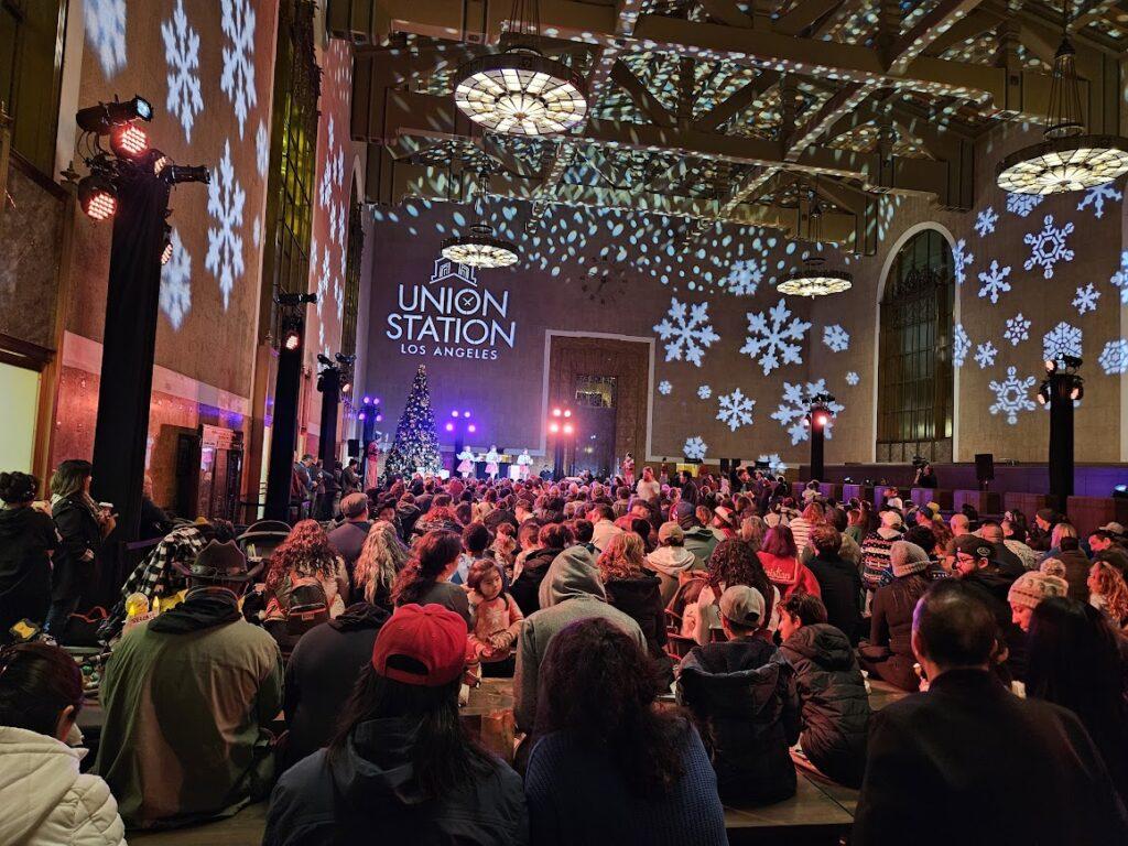 The crowd at the Union Station Los Angeles Ticket Concourse for its annual tree lighting ceremony.