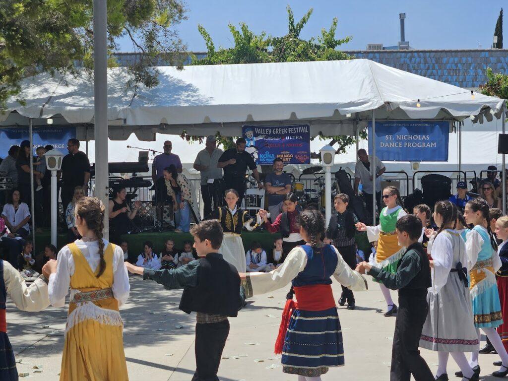 Kids dancing at the North Vally Greek Festival in Los Angeles.
